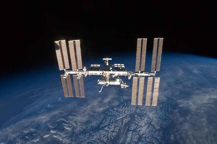 Astronaut photograph of the Internation Space Station taken from Space Shuttle Discovery.