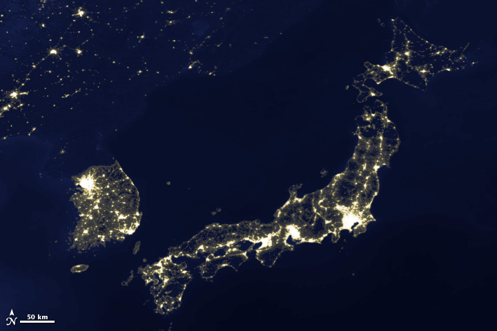 Image of Japan and Korea's city lights, 2003.