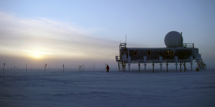 Photograph of the sun just above the horizon from the Greenland Summit, November 2008.