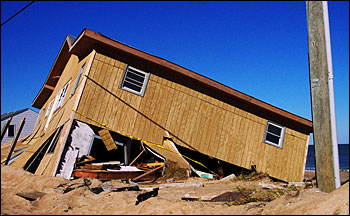 Category 4 damage: toppled house
