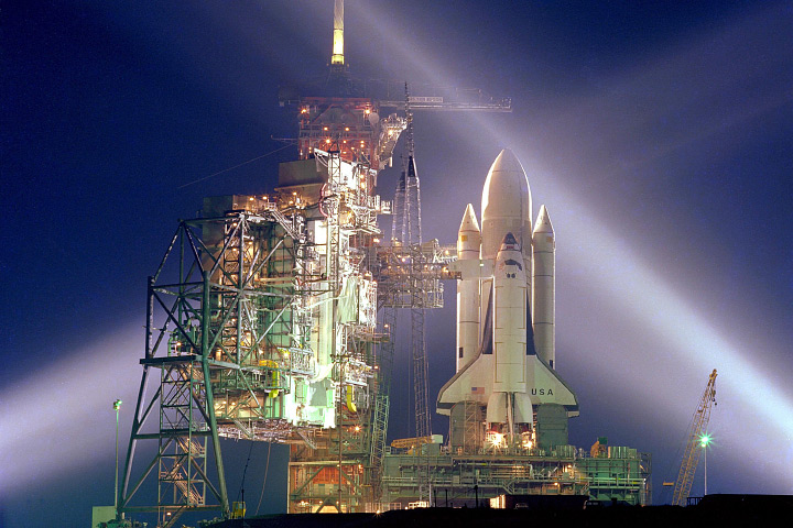 Photograph of Space Shuttle Columbia on the pad at Kennedy Space Center.