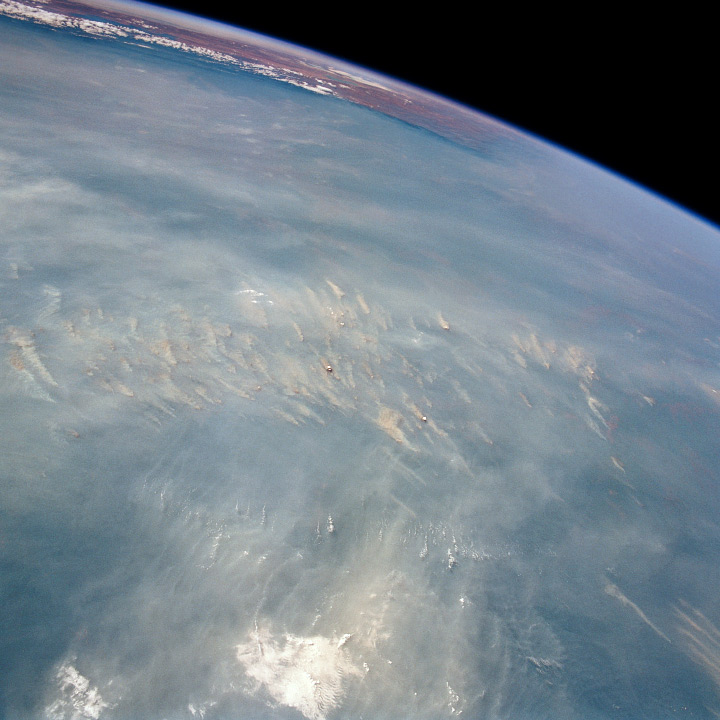 Astronaut photograph of smoke from slash and burn agriculture across the Amazon Basin.
