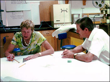 Photograph of Joanne Simpson Working With Claude Ronne, UVA