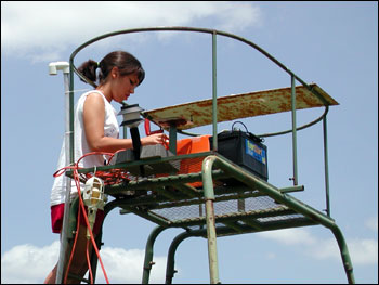 Photograph of Sarah Working on top of Tower