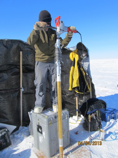 Jay, drilling in SE Greenland.