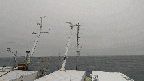 The aerosol sampling vans (affectionately known as the “aerosol trailer park”).  From left to right, the PMEL van, the Scripps van, The UCI van.  The inlet reaches 50 ft above the ocean surface.